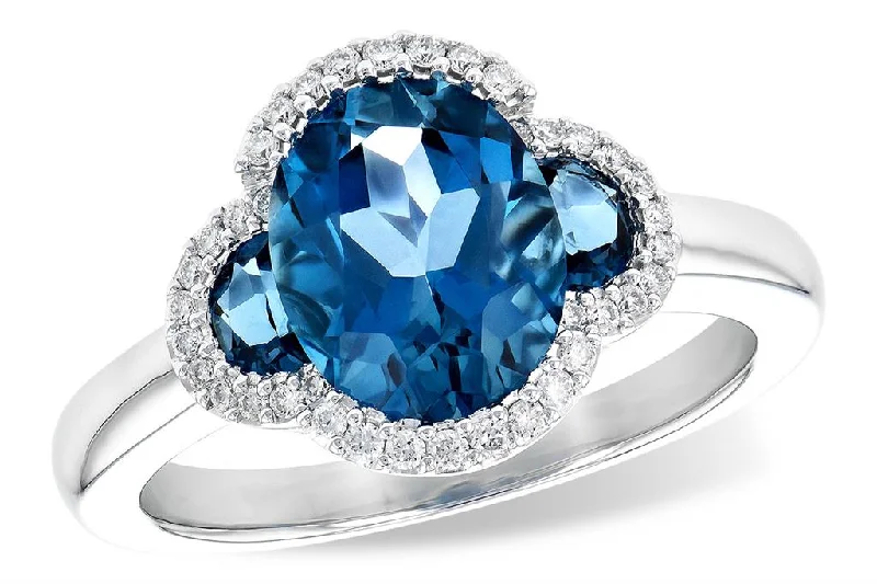 women’s engagement rings with vintage diamonds and sapphires-14K White Gold Three Stone Blue Topaz Ring