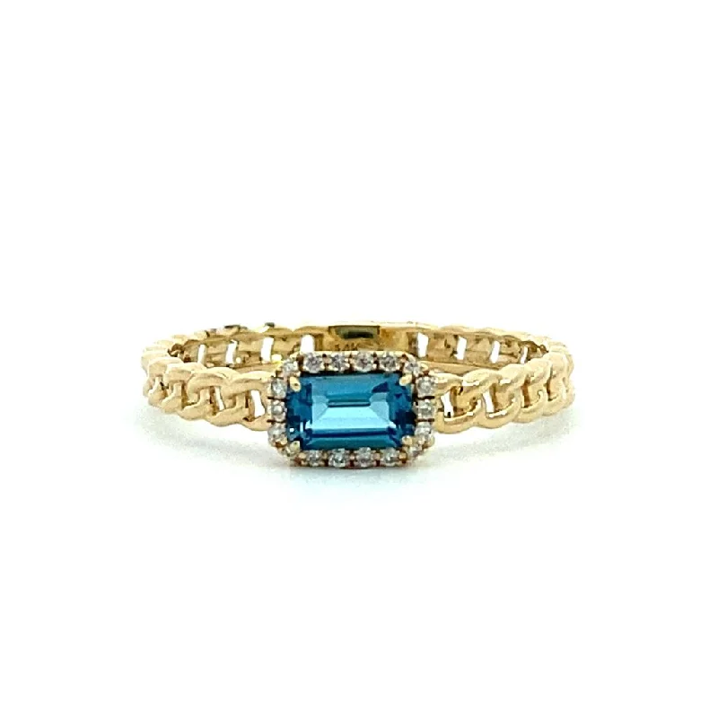 engagement rings with oval sapphires and diamond pave-14K Yellow Gold Blue Topaz And Diamond Ring