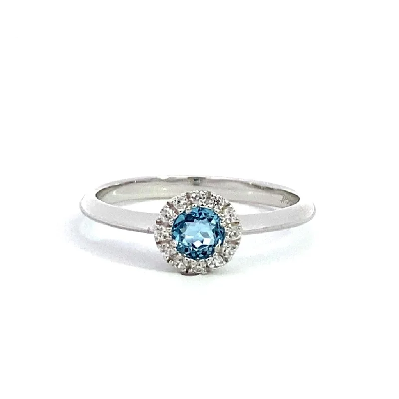 engagement rings with cushion-cut diamonds and ruby accents-December Birthstone Ring: Sterling Silver Swiss Blue Topaz Halo Ring